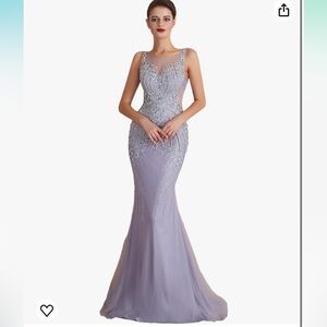 Never worn. Light purple Mermaid Evening Gown. Comes with sewn in cups. Size 14
